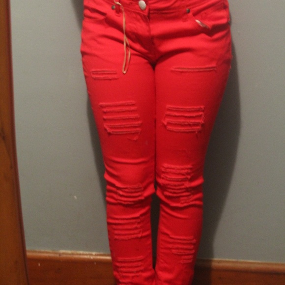 red ripped jeans